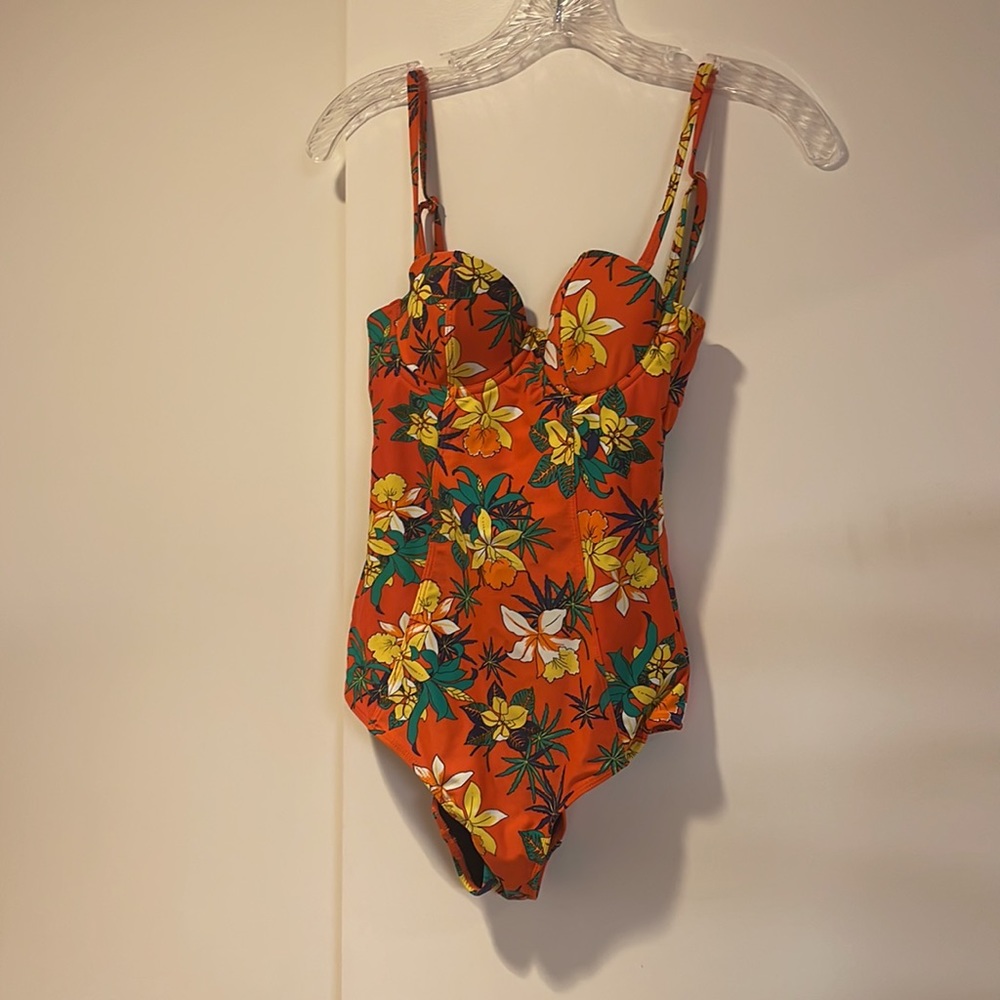 Obey swimsuit never worn.  Size S.  Beautiful colors, mostly orange